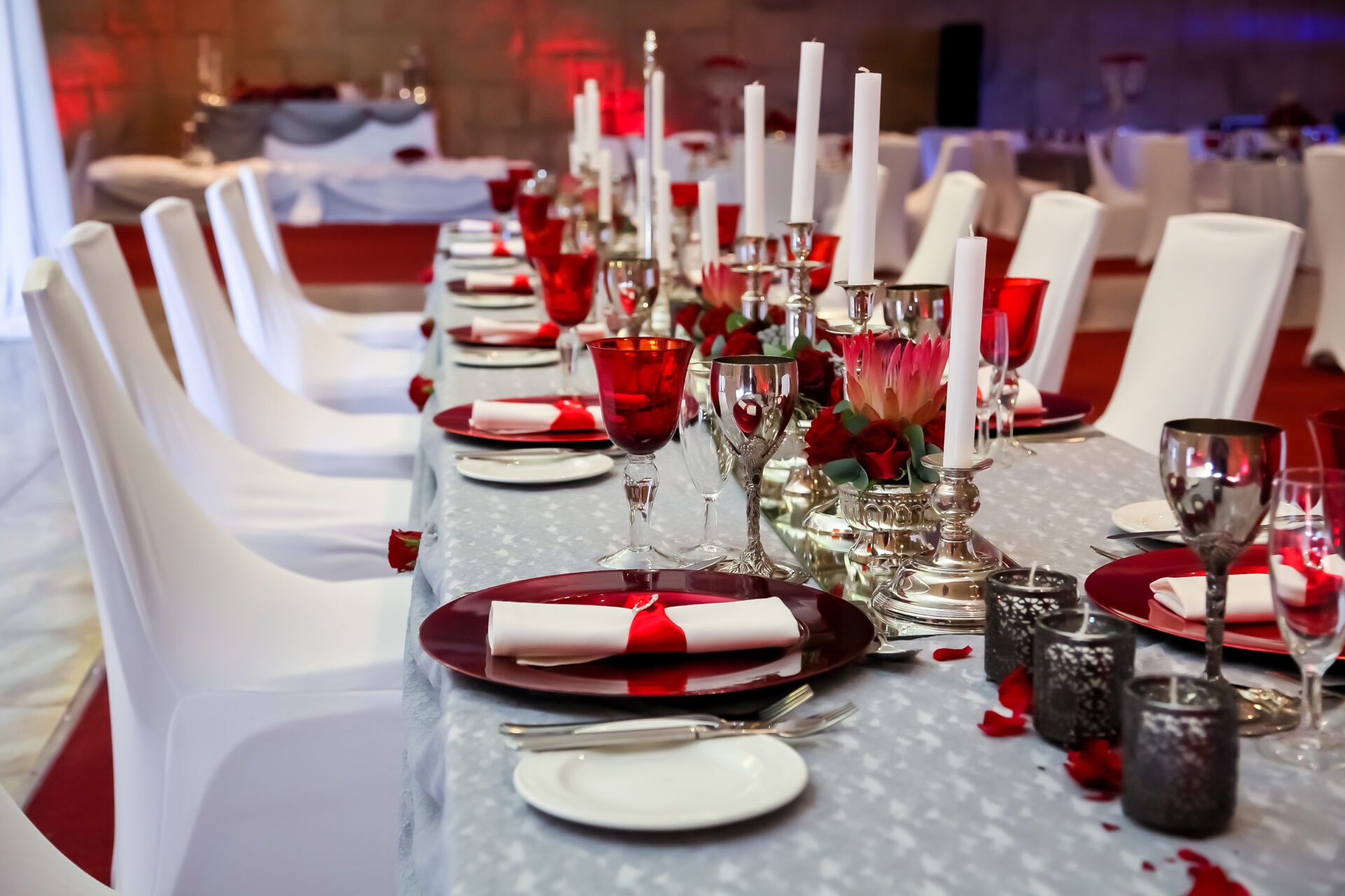Decor at corporate Christmas Gala Event Party Red and White table setting for catering & decor purposes at corporate Christmas Gala Event Party